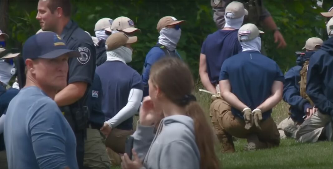 Police arrest 31 people with ties to white nationalist hate group near Pride event in Coeur d'Alene Police arrest 31 people with ties to white nationalist hate group near Pride event in Coeur d'Alene